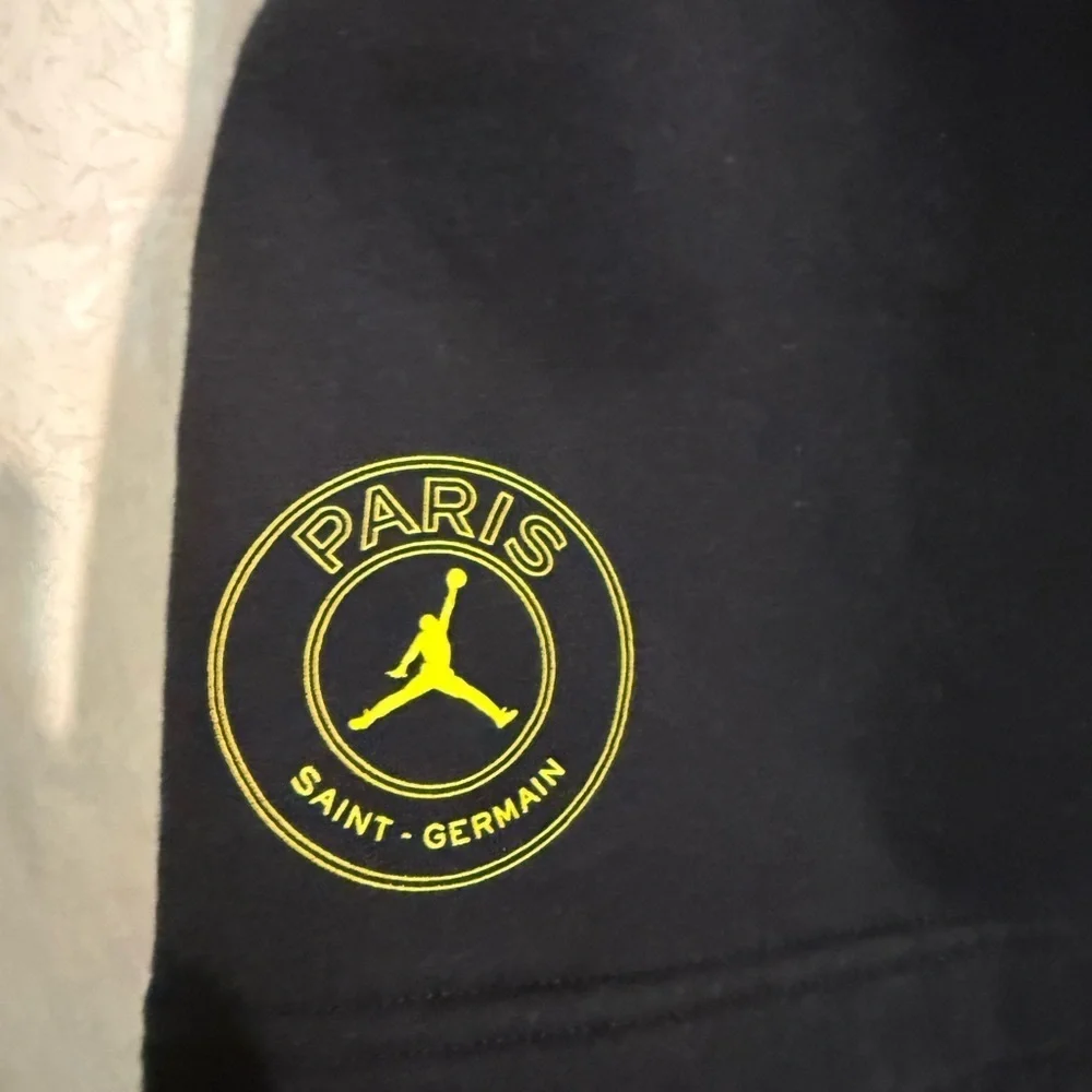 Jordan Men's Paris Saint-Germain Athletic Shorts in Black with Yellow Details Lg